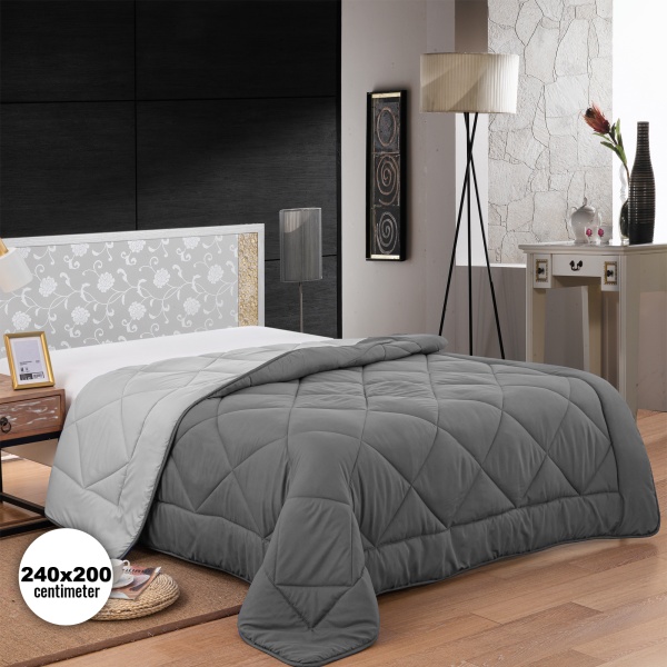 Tweekleurig microfiber dekbed van hoge kwaliteit voor extra comfort en warmte.